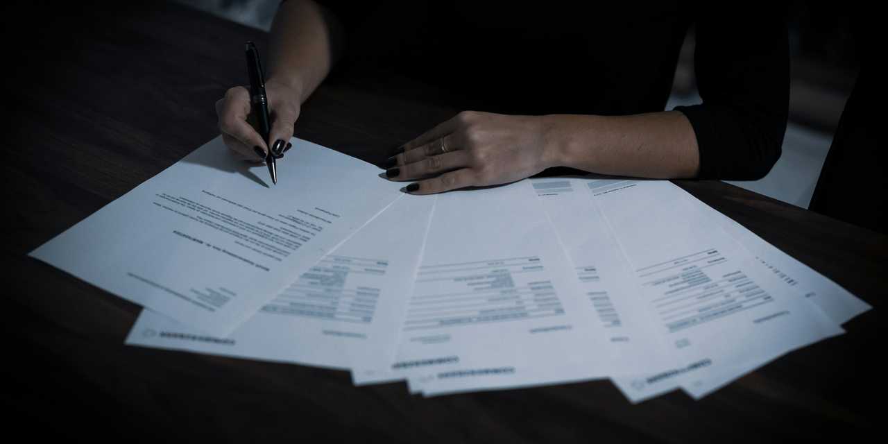 A person signing contracts