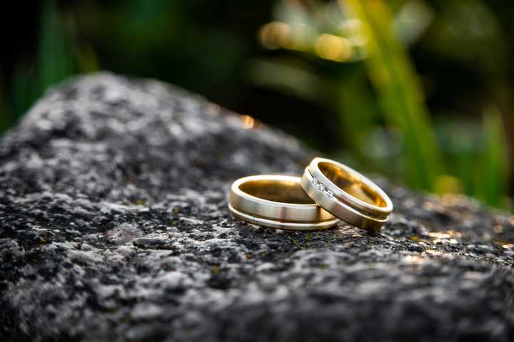 Wedding rings on a rock