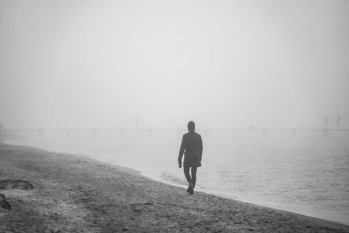 Person på stranden.